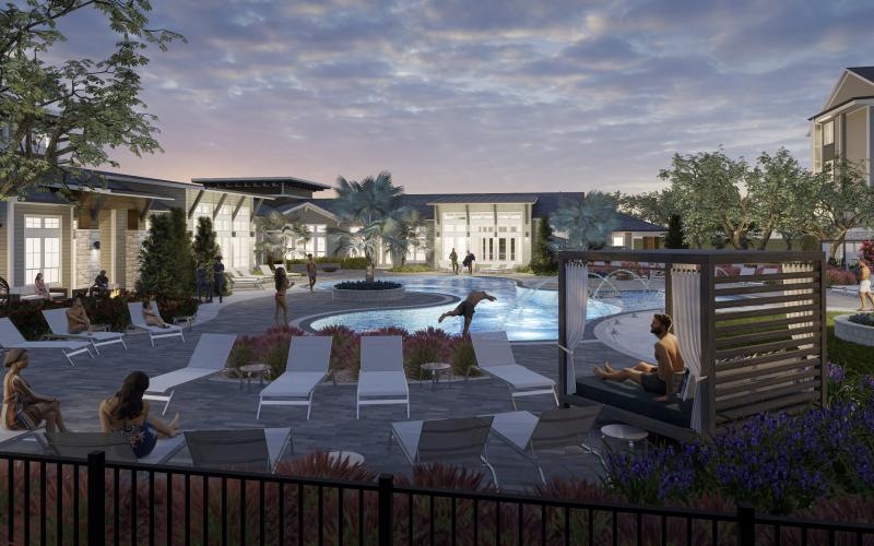 a courtyard with a pool and chairs