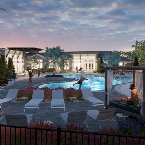 a swimming pool with lounge chairs